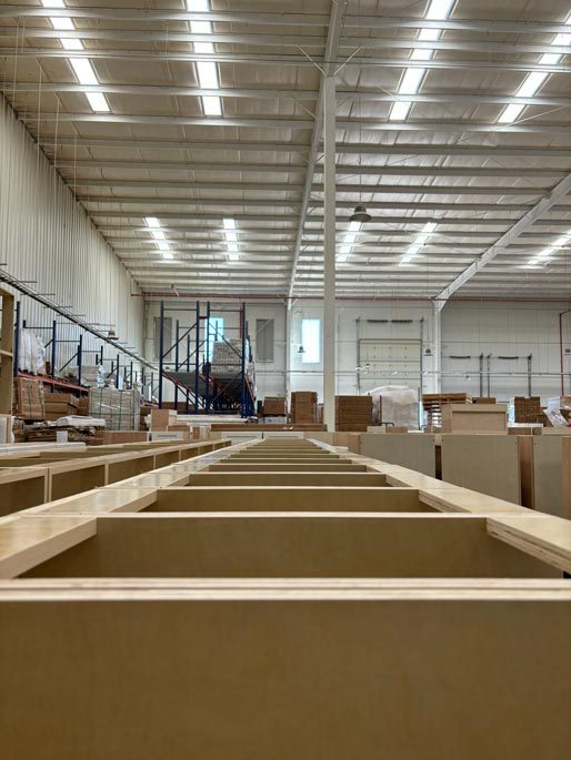 Cabinet boxes running down the Cabo factory floor